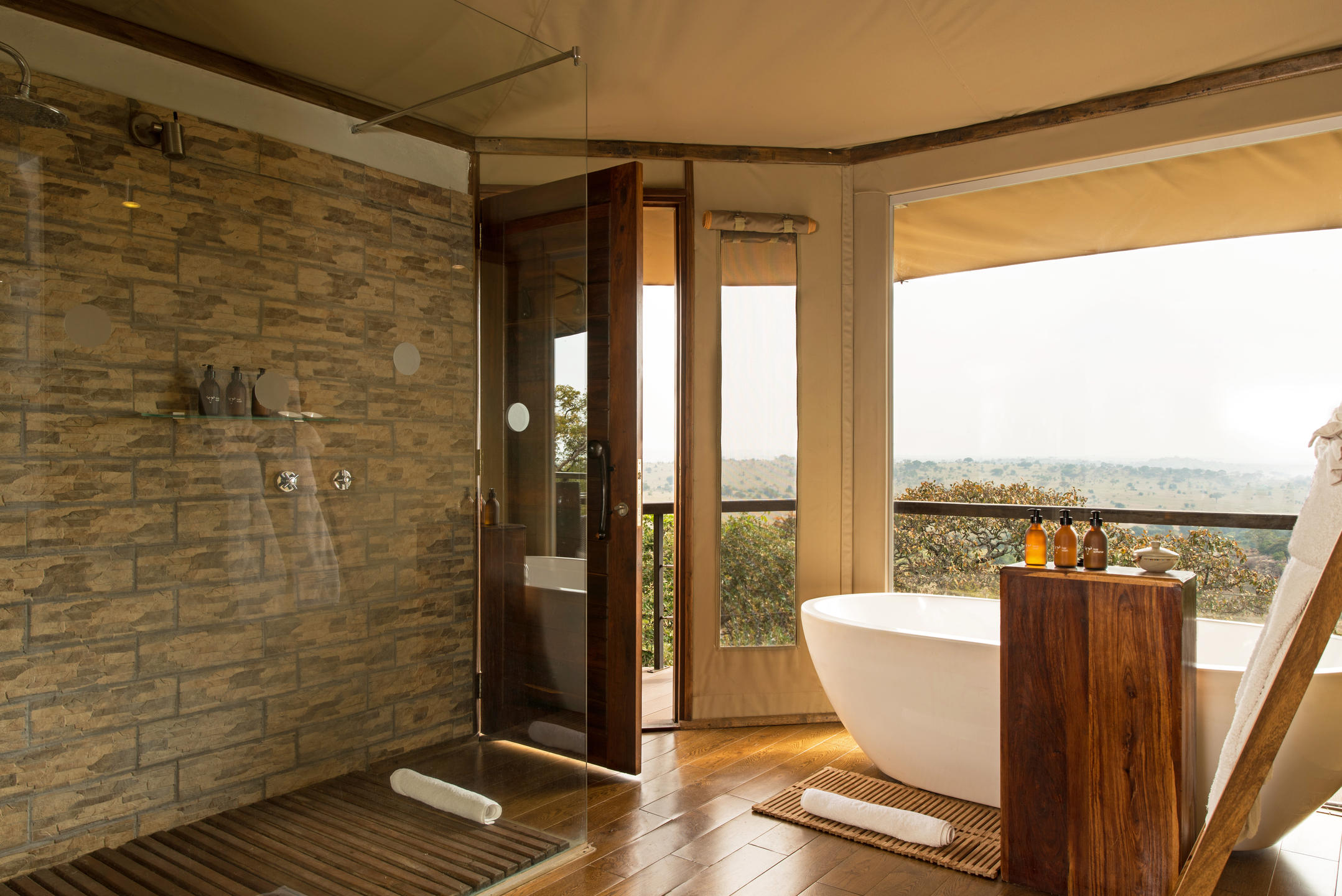 View out of a bathroom suite at the Lemala Kuria Hills Lodge
