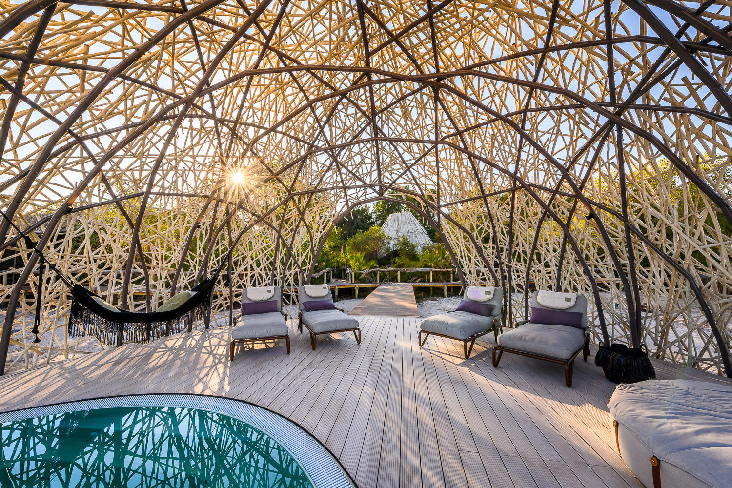 A view from inside one of the covered pools at Wilderness Jao Camp