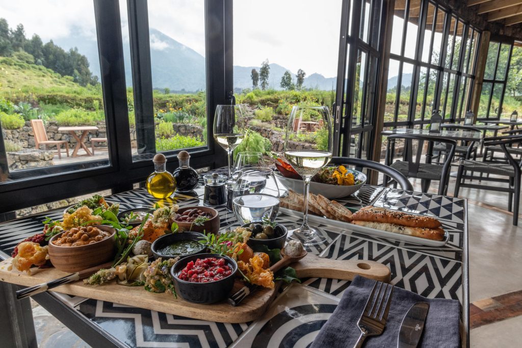 A spread of food in one of the dining rooms at Wilderness Bisate, Rwanda