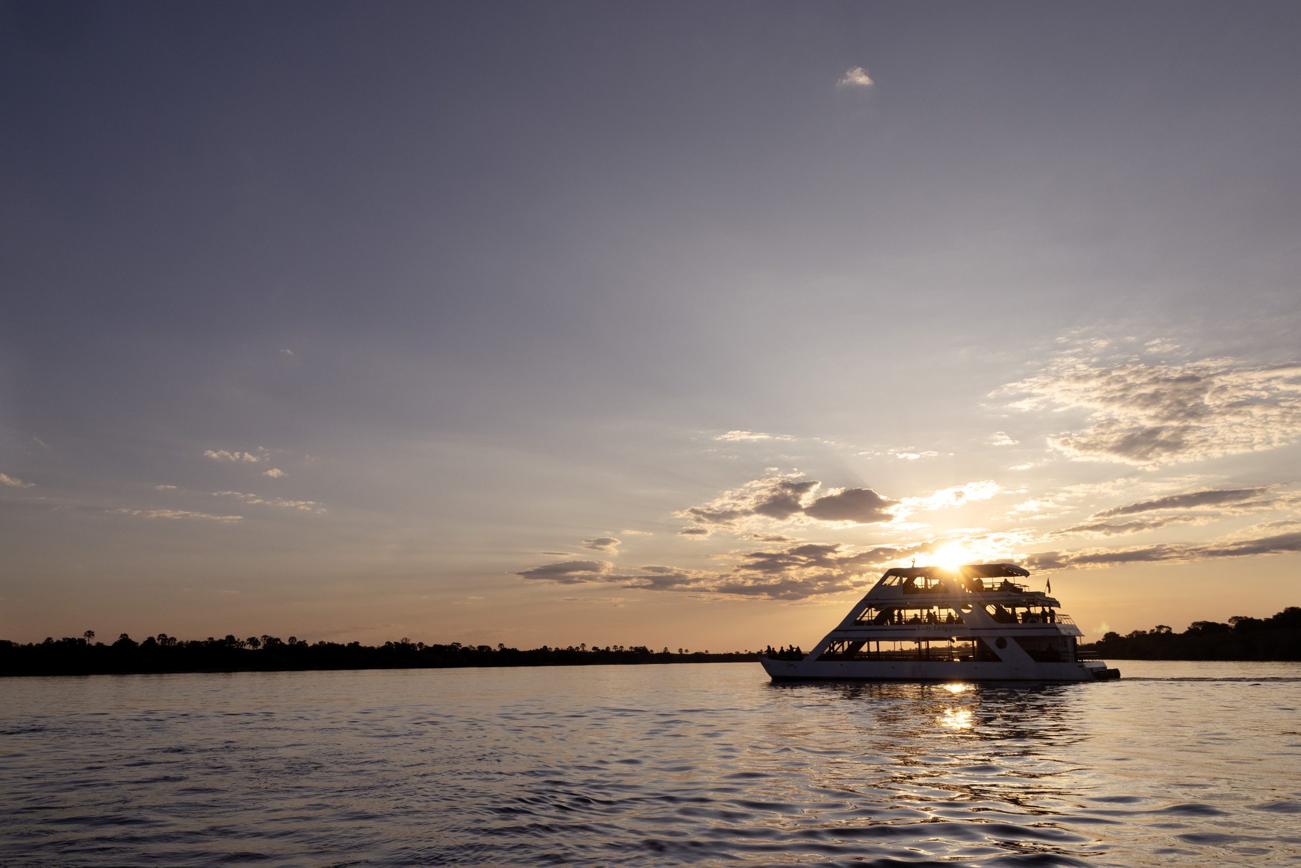 a sunset cruise ship exploring the waterways of Zimbabwe