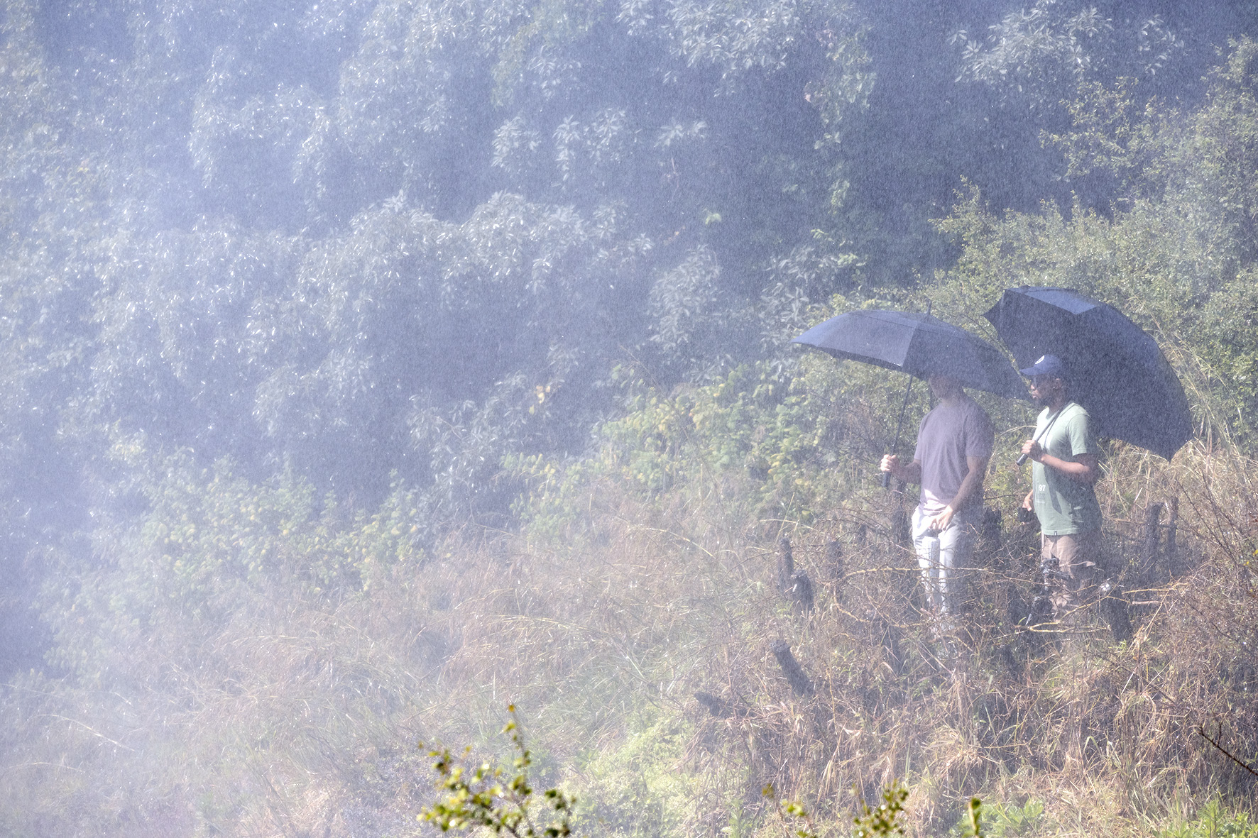 Kyle and Thato enjoy a rather wet view of Victoria Falls, Zimbabwe