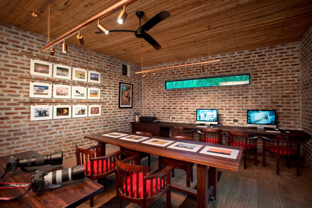 A view of the photography editing and printing room at Angama Mara lodge.