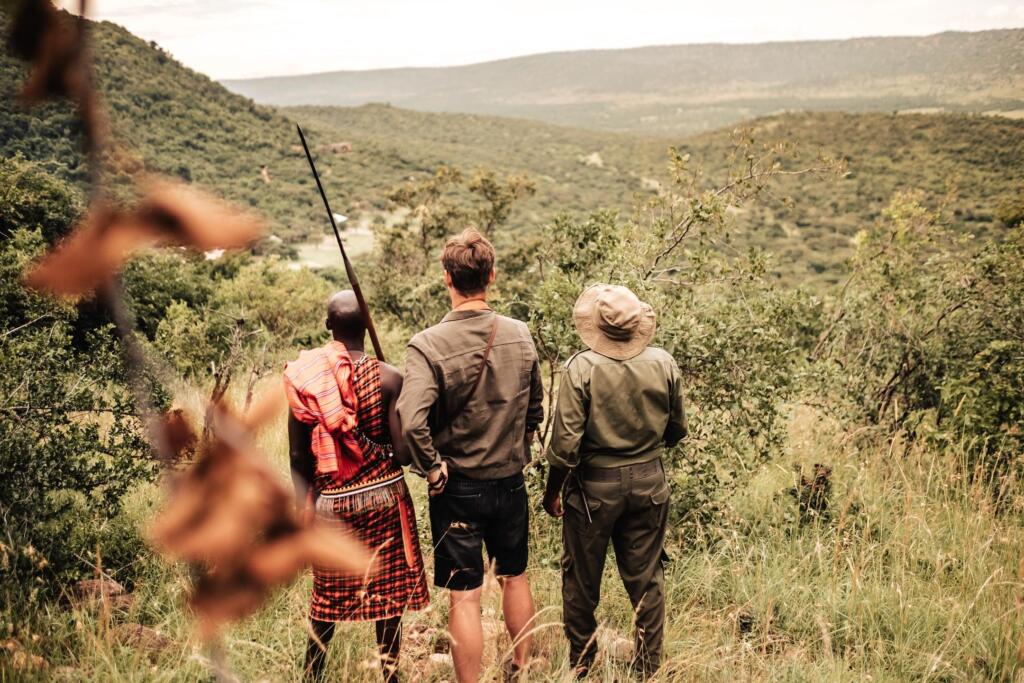 Walking safari in the hills at Cottar's 1920s Camp, Olderkesi Conservancy, Masai Mara, Kenya