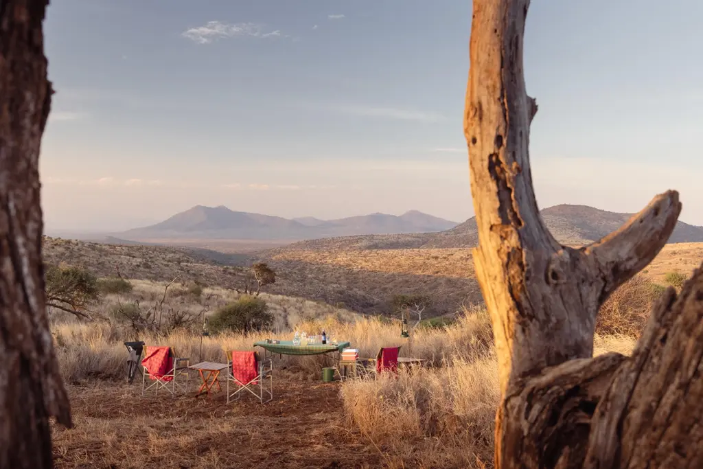Dinner setup at a fly camping experience at Lewa Wilderness, Laikipia Plateau, Kenya